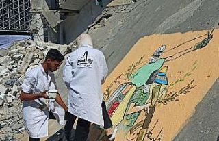 Filistinlilerden İsrail’in saldırılarına grafitili...