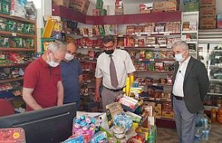 İhtiyaç sahiplerinin veresiye defterlerini sildiler