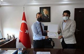 Dereceye giren din görevlilerine başarı belgesi...