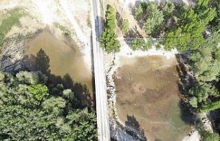 Koyunlar 8 asır sonra yapay gölette karşıdan karşıya...