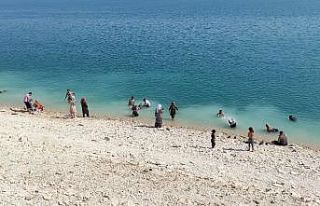 Artan boğulma vakalarına rağmen barajda serinlediler