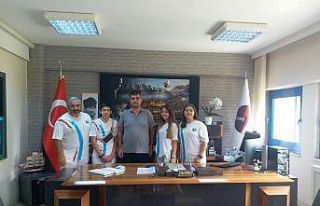 Başarılı sporcular Akçal’ı ziyaret etti