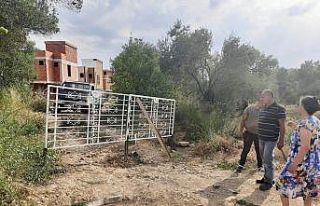"Benim arsamdan geçiyor" deyip yolu kapattı