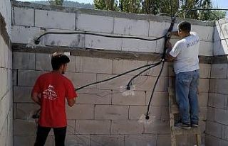 Evi yanan 11 kişilik aileye yardım