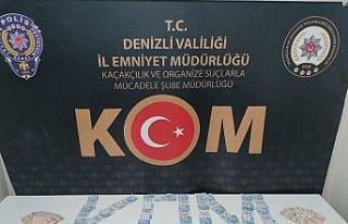 Sahte paraya orijinal hissi vermek için mum kullanmışlar