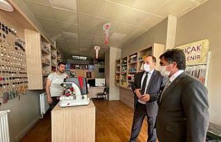 MHP İl Başkanı Karataş esnafla bir araya gelmeye...