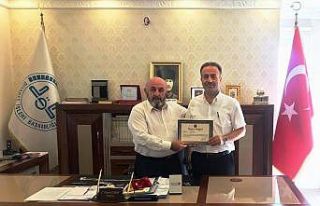 Müftü Eren’e başarı ödülü