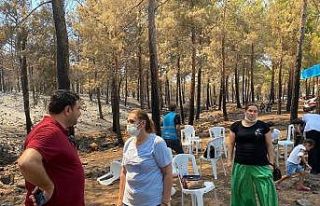 Mut Belediyesi yangın bölgesinde su ve kumanya dağıttı