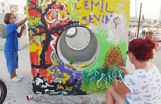 Sun’i resiflere balık resimleri yaptılar