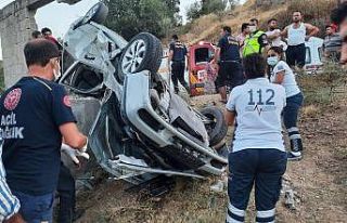 Sürücü takla atan otomobilde sıkışarak yaralandı