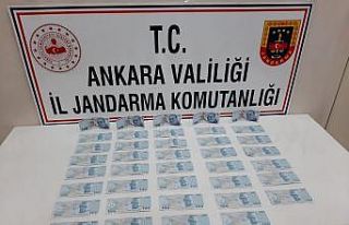 Üzerindeki sahte paralarla yakalandı