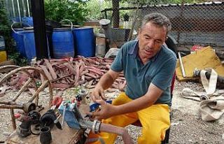 Yanan hortumları onararak arkadaşlarına "Güç"...