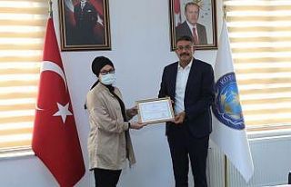 Aynur Koçuk Mercan’a teşekkür belgesi