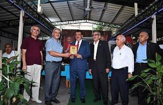 Başkan Gürkan, muhtarlara teşekkür plaketi programına...