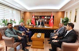 Nursaçan ve yönetim kurulu üyeleri MHP İl Başkanı...