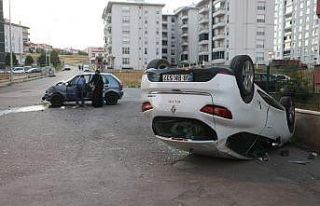 Ters dönen otomobilden burnu bile kanamadan çıktı