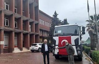 Damperli kamyon dualar ve kurban kesimi eşliğinde...