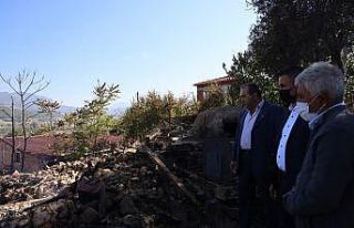 Evi ve samanlığı yanan aileye ziyaret