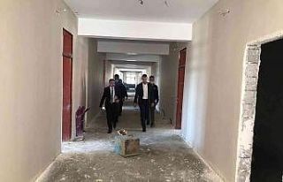 Kaymakam Savar yapımı devam eden okulu inceledi