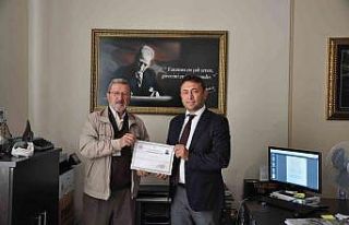 Simav’da İHA muhabirine teşekkür belgesi