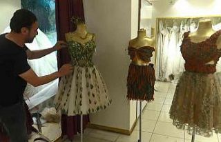 Diyarbakırlı modacı ağaç yapraklarında gelinlik...