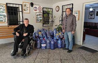 Engelliler için 100 bin mavi kapak topladı