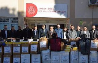 Gurbetteki Bafralılardan 700 öğrenciye bot ve mont...