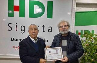 Ünsal’dan Kişi’ye teşekkür belgesi