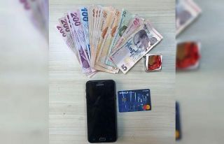 Çaldığı kredi kartı ile alışverişi kısa sürdü