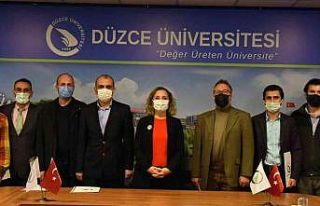 Rektör Çakar başarılı akademisyen ve öğrencileri...