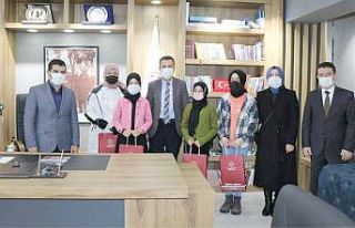 Madalya kazanan öğrencilerden Aslan’a ziyaret