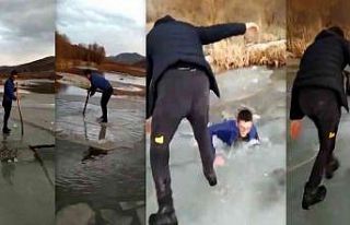 Nehirde buz kütlesini sal olarak kullanan gençlerden...