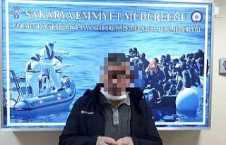 24 yıl hapis cezası bulunan göçmen kaçakçısı...