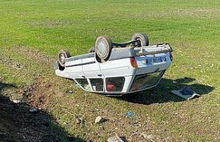 Takla atan otomobilden yaralı kurtuldu