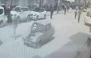 Kadın polisi metrelerce aracın kaputunda sürükleyen...