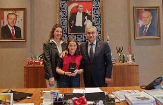 Başkan Işık’tan il birincisi Can’a tablet