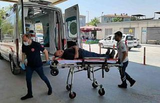 Makineye sıkışan işçi yaralandı