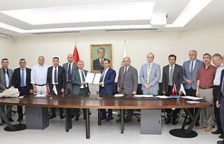 ERÜ ve Koop-İş Sendikası Arasında Toplu İş...