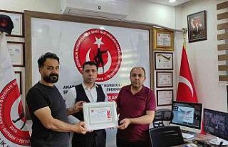 İş insanı Ekremoğlu’na onur belgesi verildi