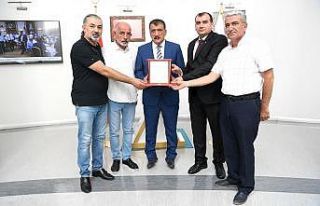 Esnaf Oda Başkanlarından Gürkan’a plaket