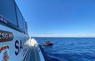 İzmir açıklarında 129 göçmen kurtarıldı, 3...