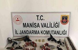 Turgutlu’da bir evde yapılan aramada çok sayıda...