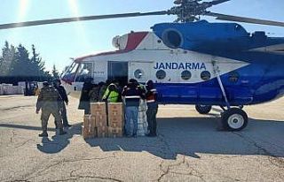 Mehmetçik 532 köye helikopter ile yardım malzemesi...
