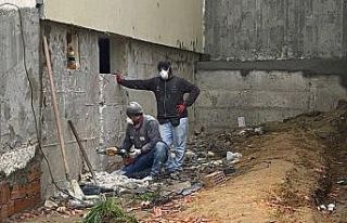 Altı katlı binanın perde betonunun kesilmek istenmesi...