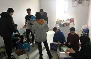 İhtiyaç sahibi 16 aileye yardım kolisi dağıttılar