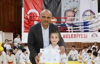 Körfez’de 100 sporcuya yeni kuşak