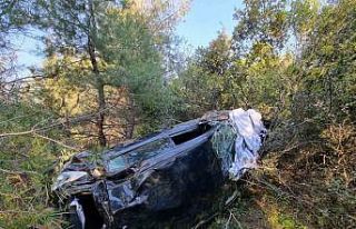 Takla atan otomobilden yaralı kurtuldu