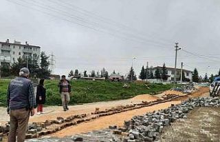 Devam eden yol tamir çalışmalarını yerinde inceledi