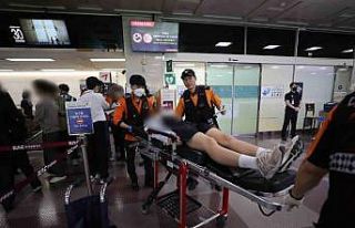 Güney Kore’de uçuş sırasında kapıyı açan...