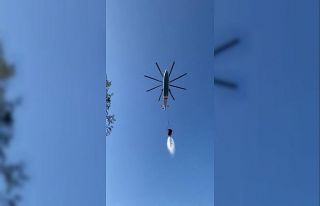 Helikopterin soğutma çalışmasını çeken muhabirler...
